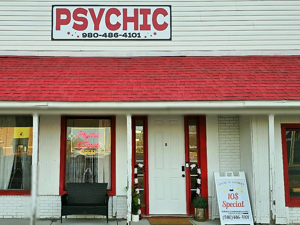 Psychic of Matthews storefront on Monroe Rd — psychic and tarot neon sign, Matthews NC